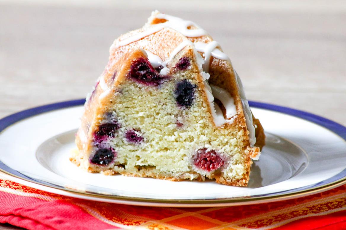  A classic British cake becomes even more marvelous with berries!
