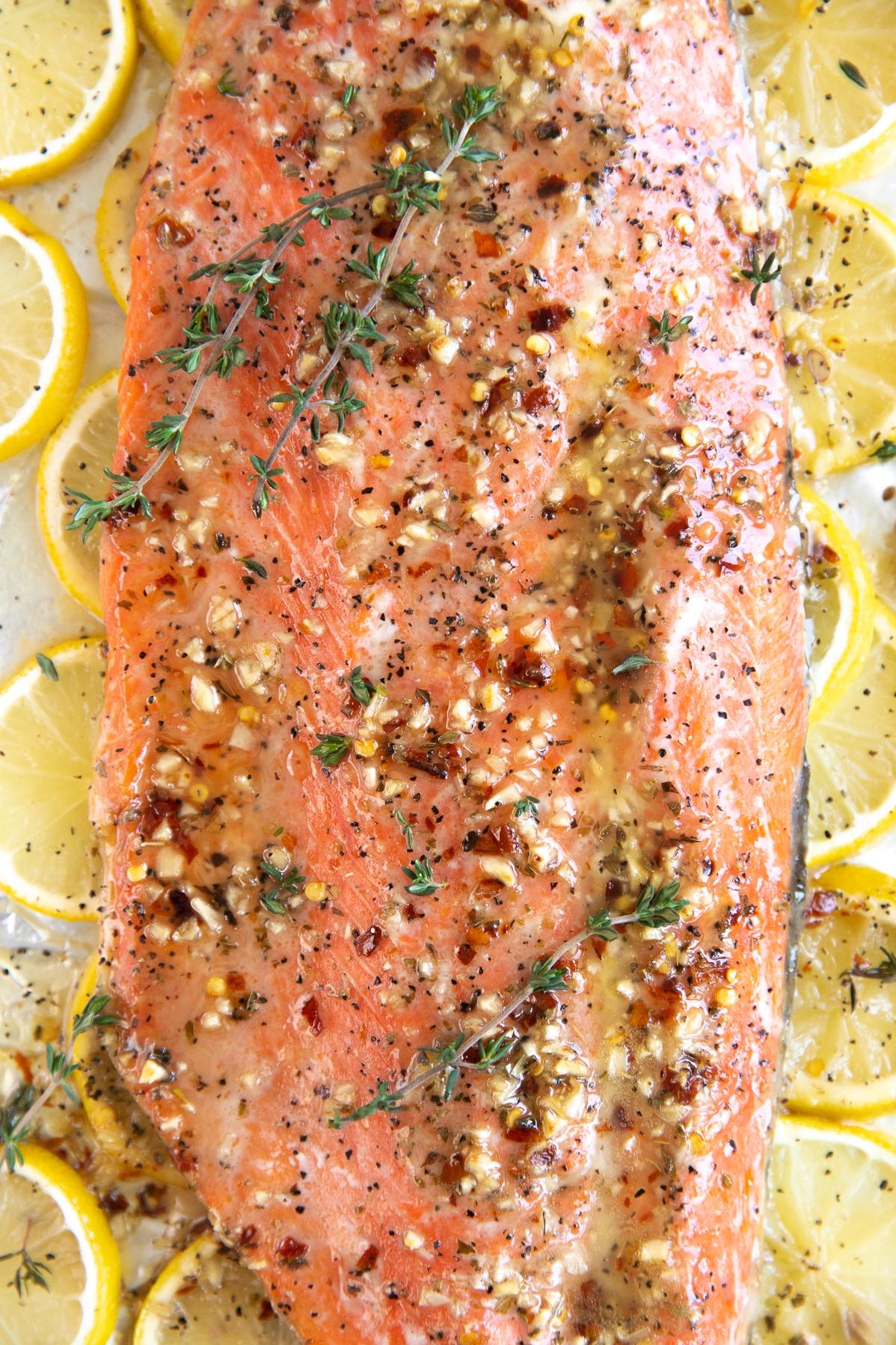 A juicy salmon fillet topped with zesty lemon butter