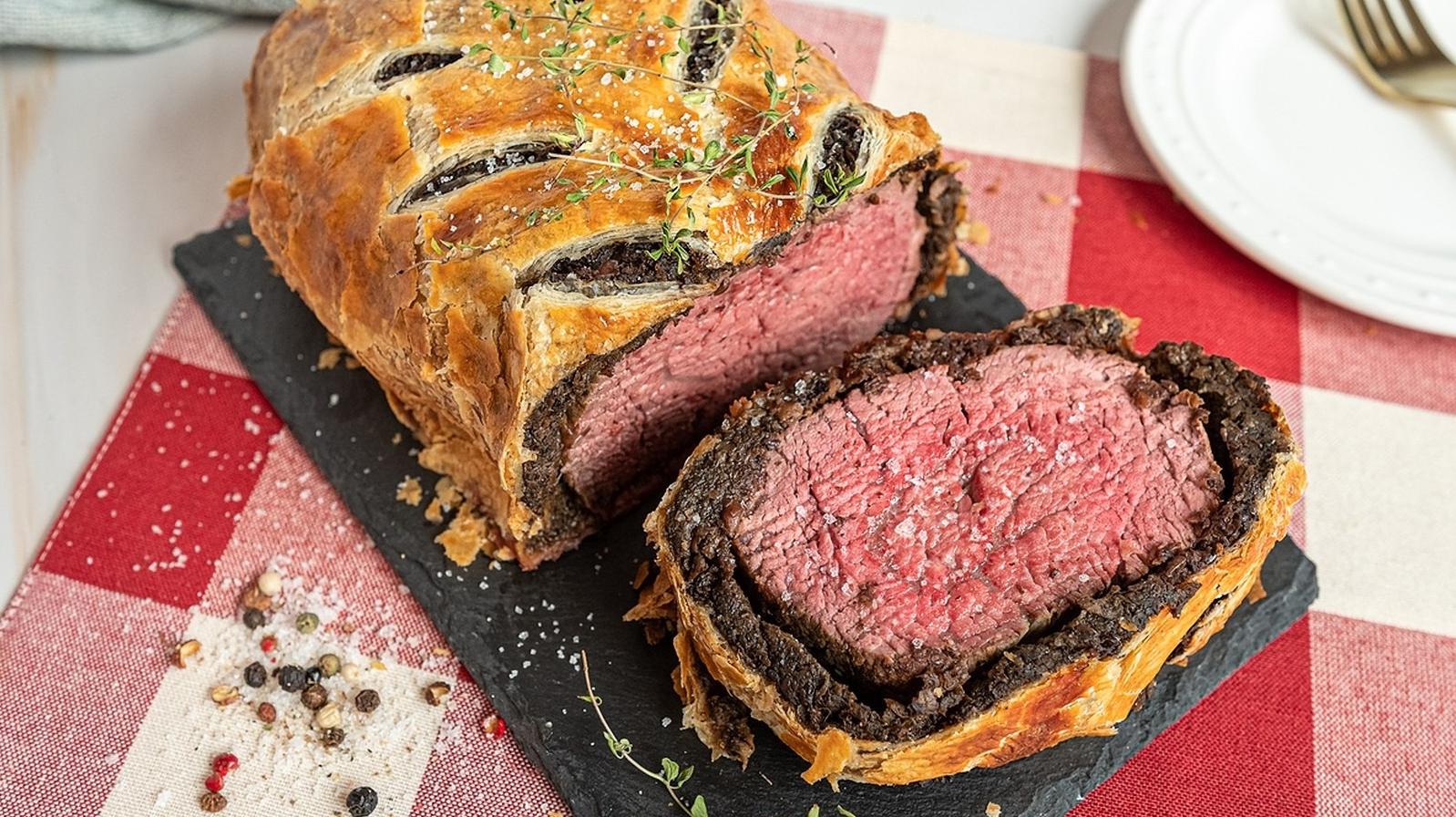  A mouthwatering cross-section of our It Tastes Like Beef Wellington, revealing all its delectable layers.
