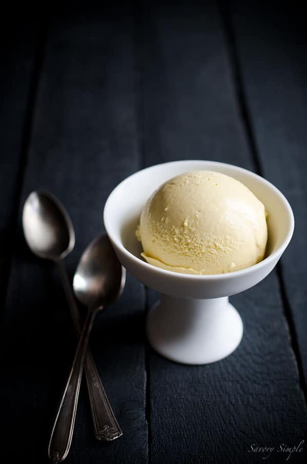 A scoop of smooth and velvety Irish ice cream melting over a warm slice of apple pie