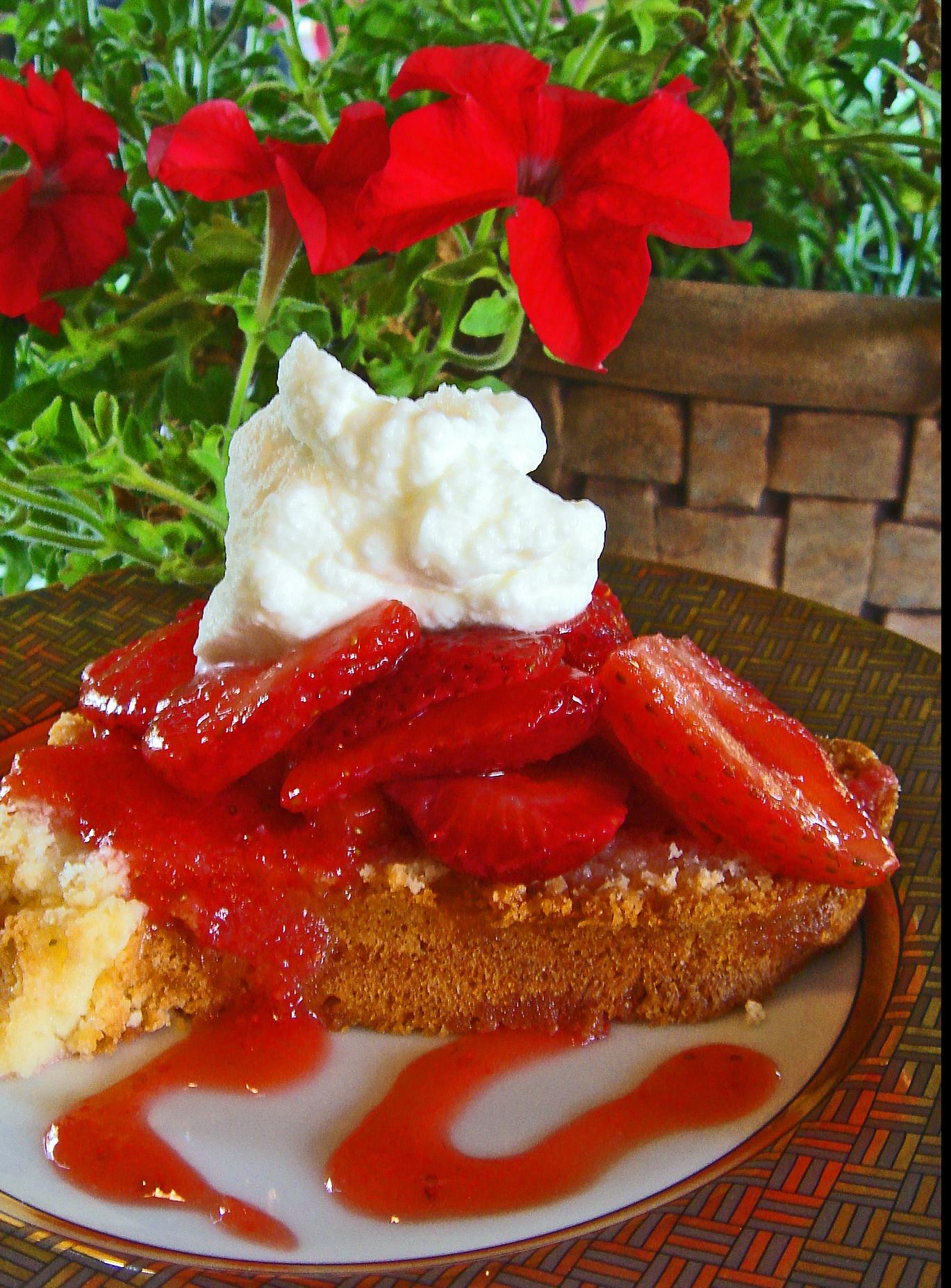  A slice of heaven on a plate: Cream Cheese Pound Cake with fresh strawberries and whipped cream.