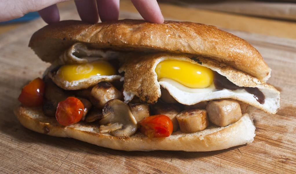  Bite into a warm, fluffy roll bursting with the goodness of bacon, eggs, and cheese.