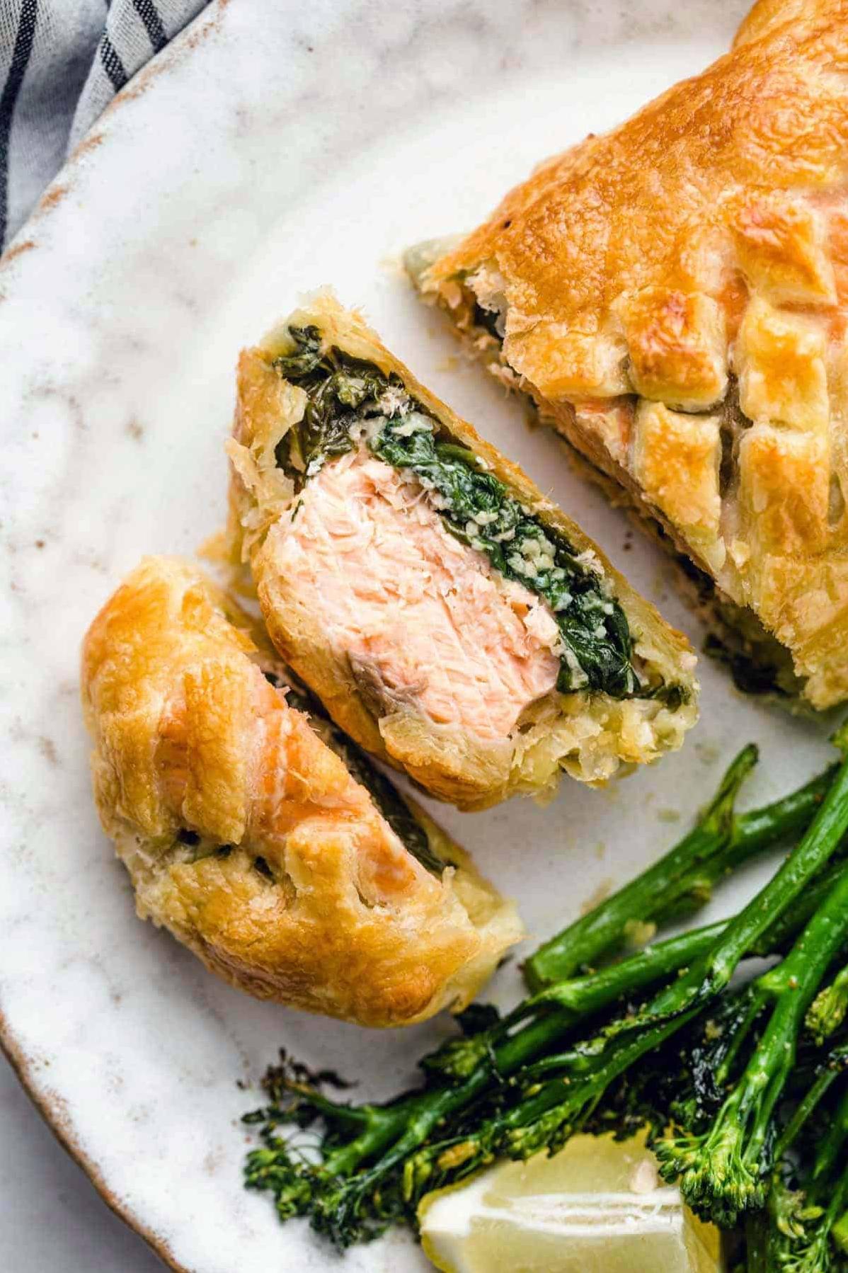  Flaky, buttery pastry crust enveloping tender salmon
