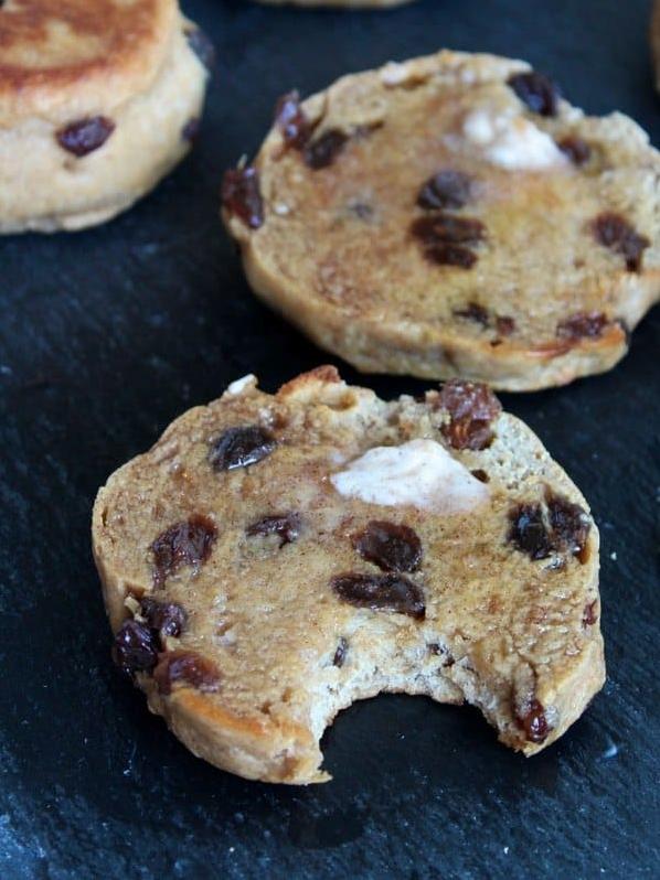  Freshly baked raisin English muffins, perfect for a cozy breakfast at home.