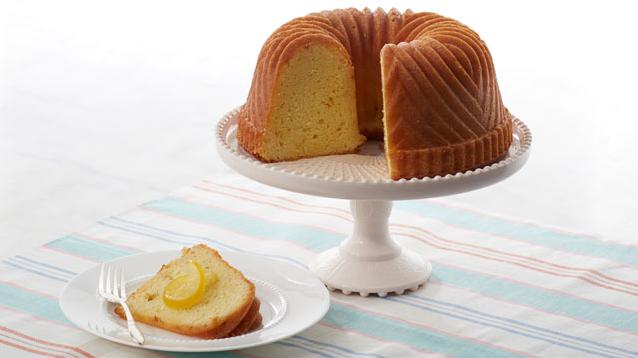  Glistening lemon pound cake coated with a zesty lemon syrup.