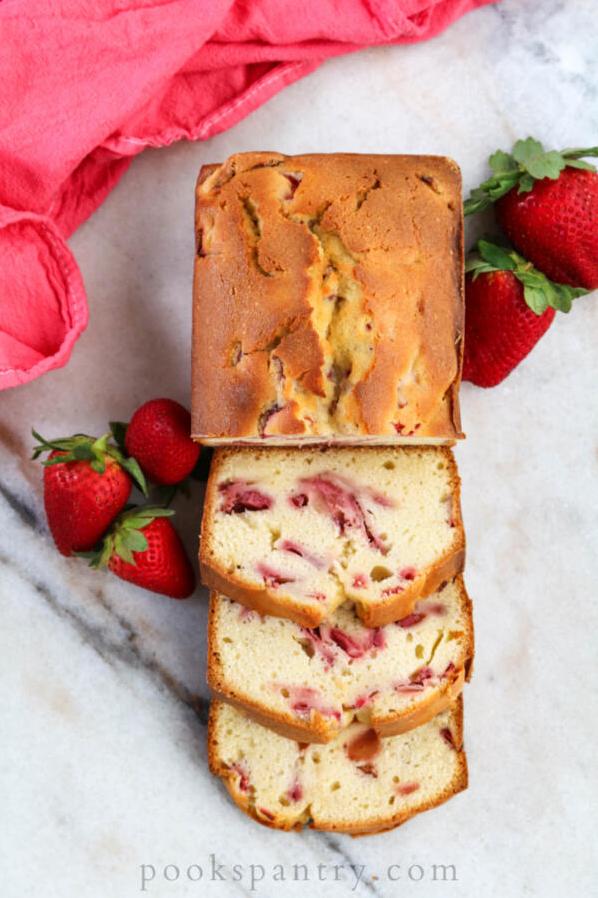  Indulge in every decadent bite of this Cream Cheese Pound Cake with juicy strawberries and luscious cream.