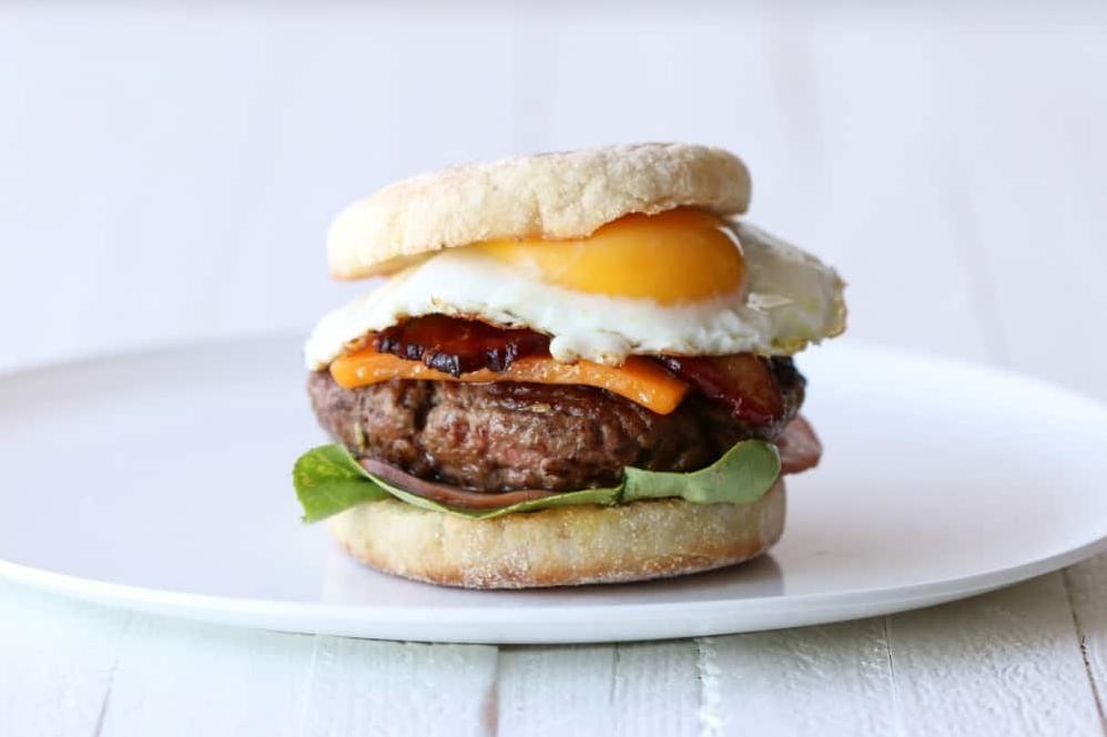  Juicy burgers served on English muffins, ready to indulge in!
