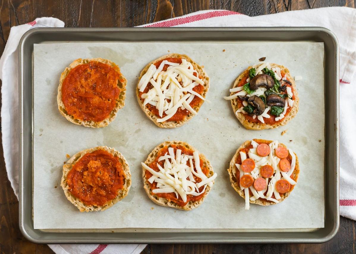  Kids will love helping to assemble these mini pizzas and picking out their favorite toppings.