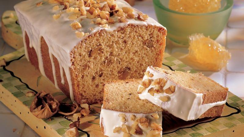  Slicing into this walnut pound cake is like unwrapping a present filled with nutty delight!