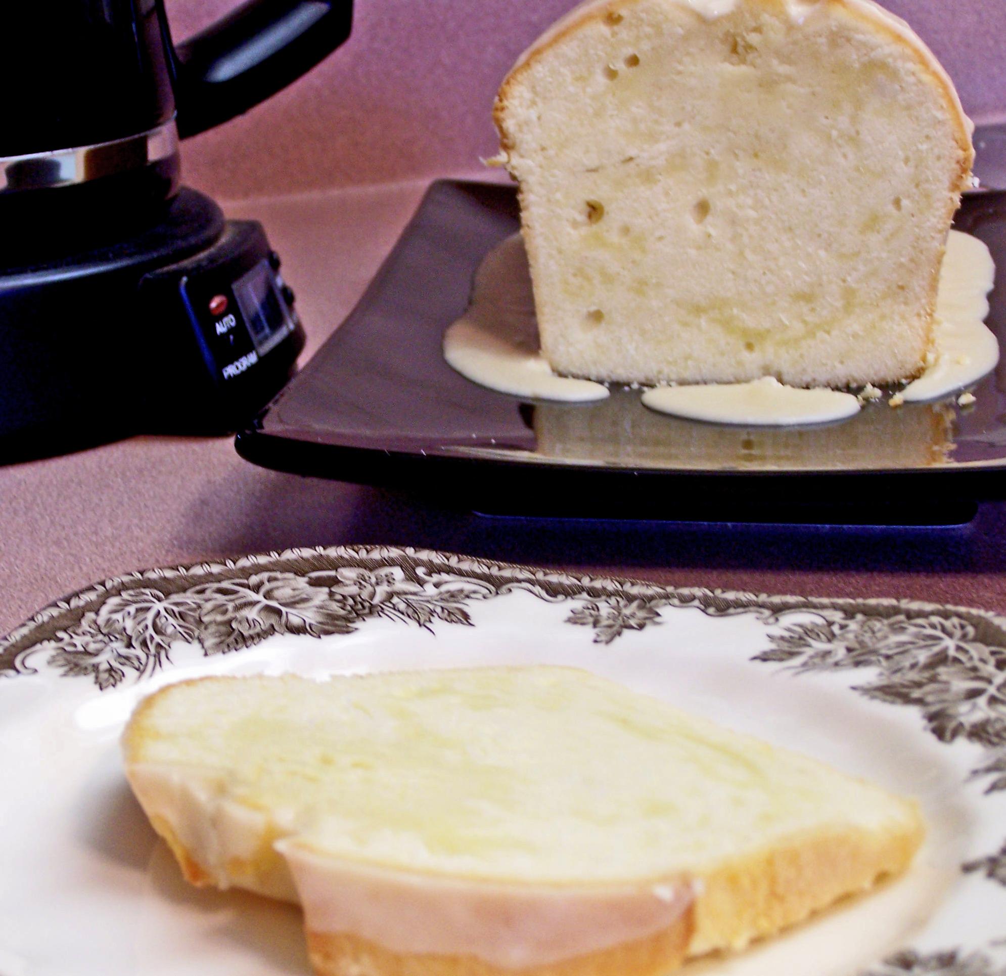 Sure! Here are 11 unique photo captions for the Glazed Almond Pound Cake recipe: