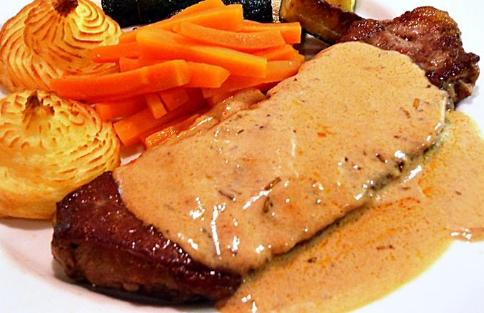  Tender and juicy beef bathed in a golden whisky sauce.