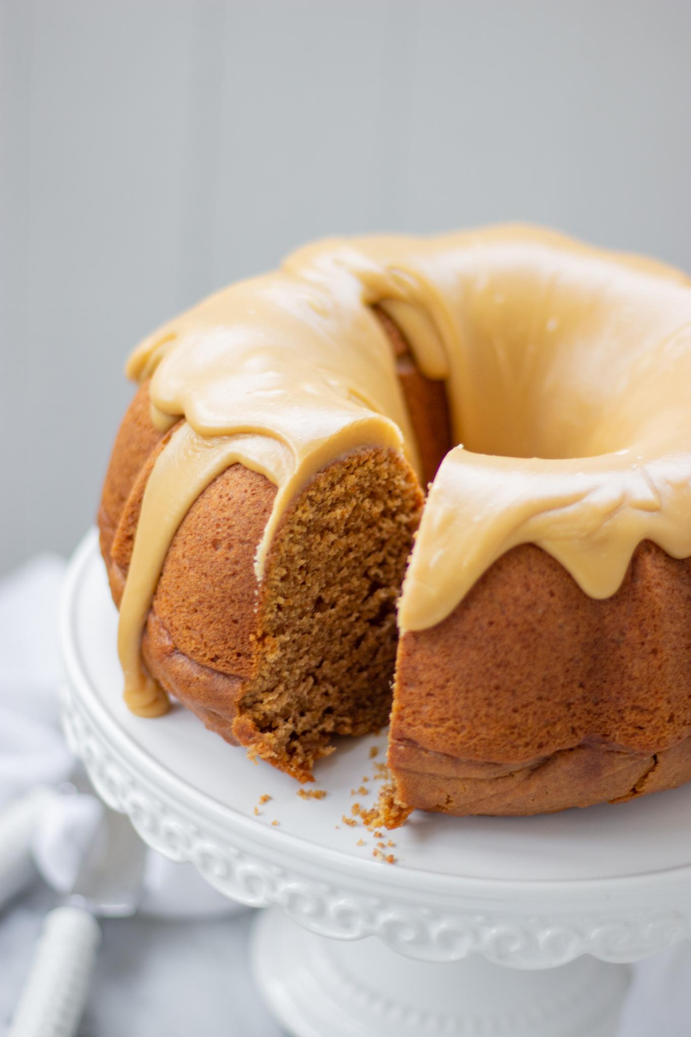  The perfect slice of sweet potato pound cake topped with warm caramel sauce.