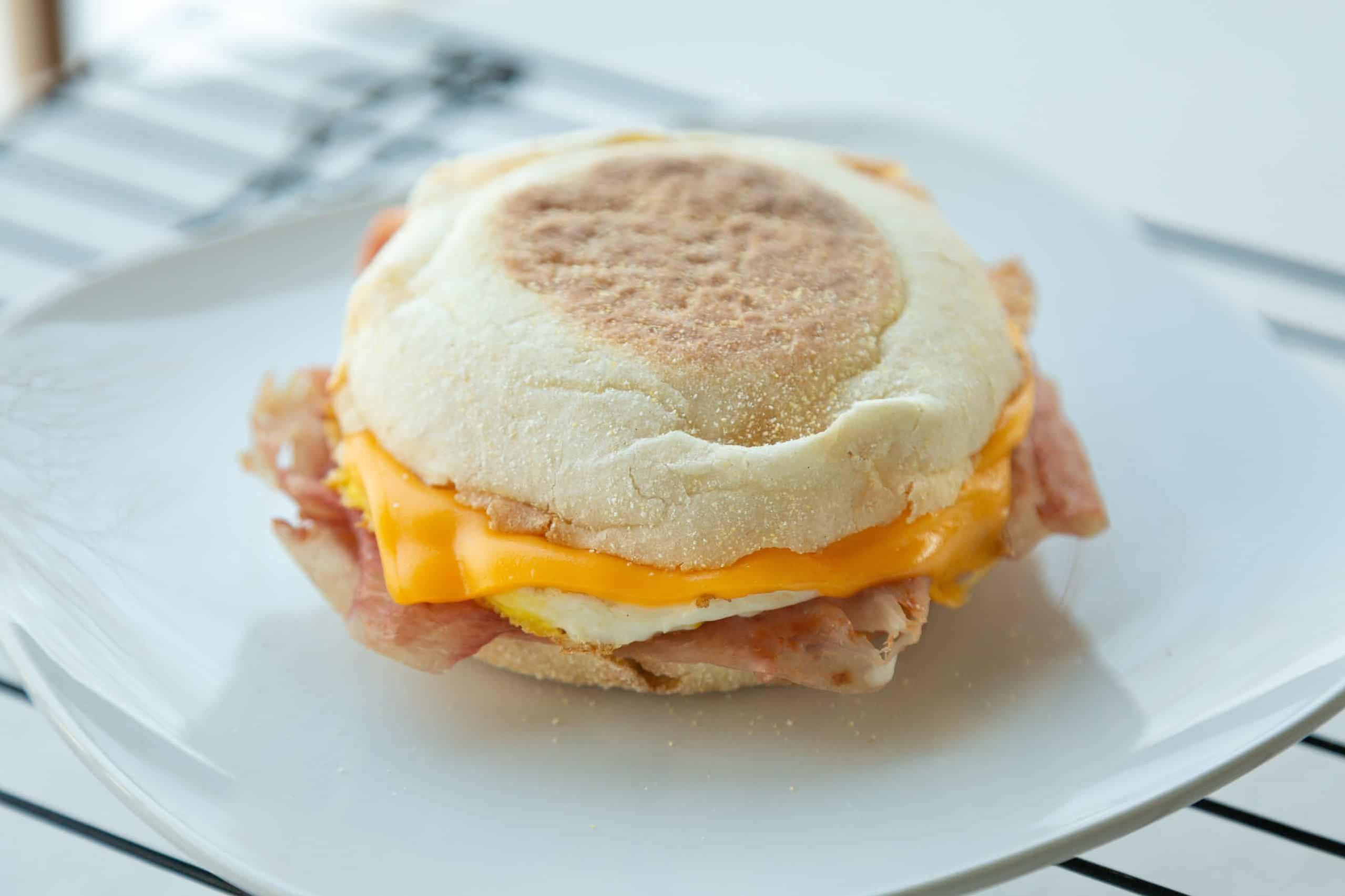 The salty ham adds the perfect touch to this savory breakfast sandwich.