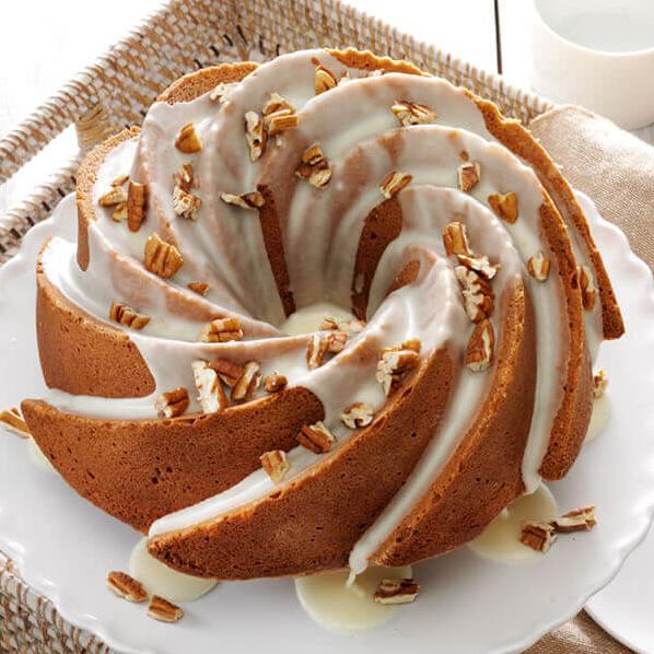  The tender crumb, the crunchy pecans, the fragrant orange zest, and glaze make this cake an irresistible treat.