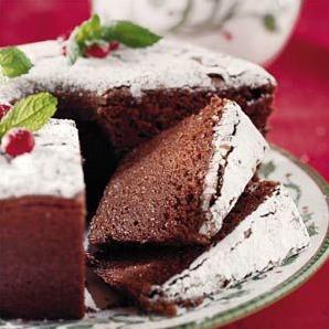  The warm aroma of chocolate fills the air as the cake bakes in the oven.