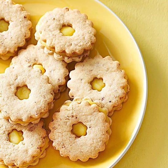  These English Lemon-Curd Cookies are a perfect tea-time treat for any day.