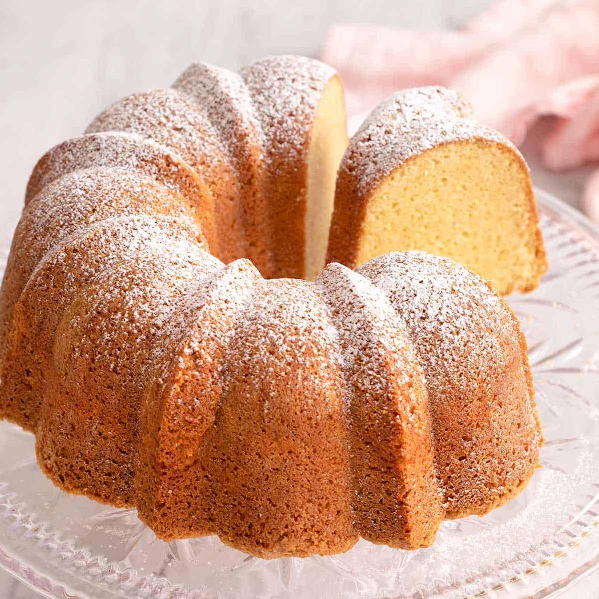  Treat yourself to a warm slice of cake and experience the burst of tangy and sweet flavors in every bite.