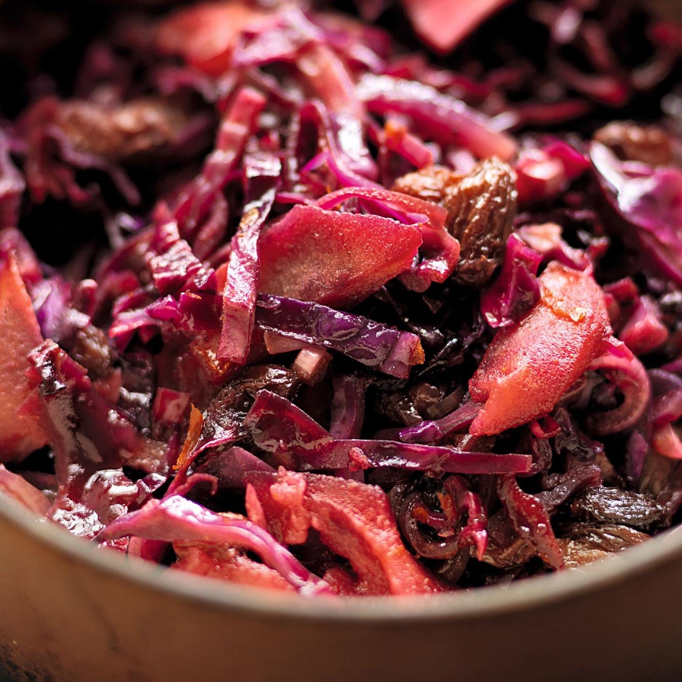  Vibrant red cabbage pickled in a tangy mix of vinegar and spices.