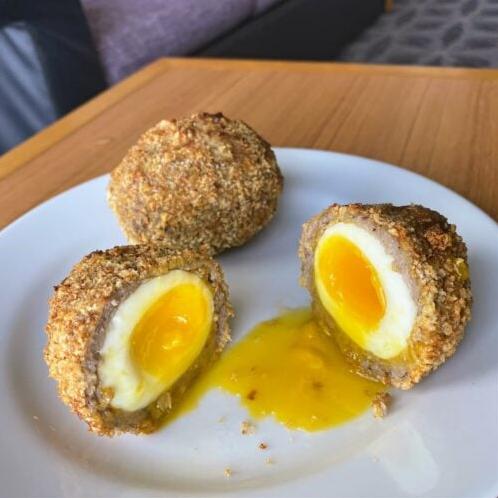  With a crispy exterior and a runny yolk, these Scotch eggs are irresistible.